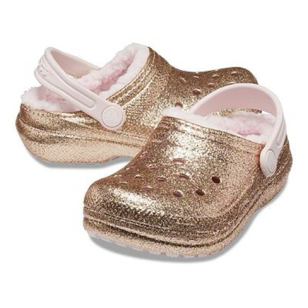 Crocs- gold glitter with fuzzy pink interior.Brand new with Tags
